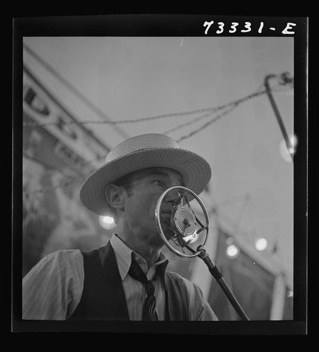 Untitled photo, possibly related to: Klamath Falls, Oregon. Sideshow barker at the circus