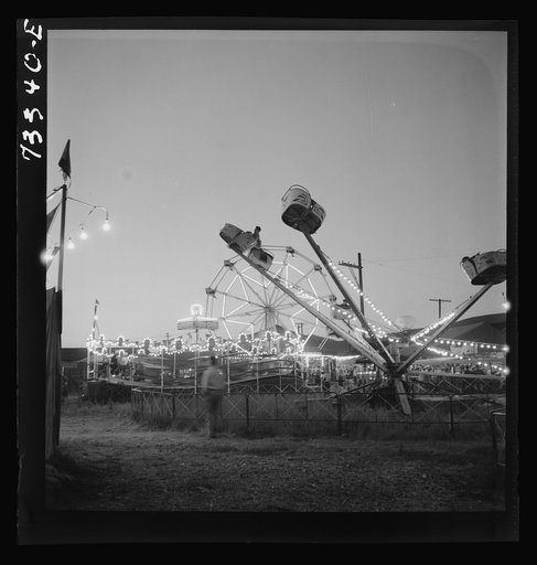 Untitled photo, possibly related to: Klamath Falls, Oregon. Carnival rides at the circus