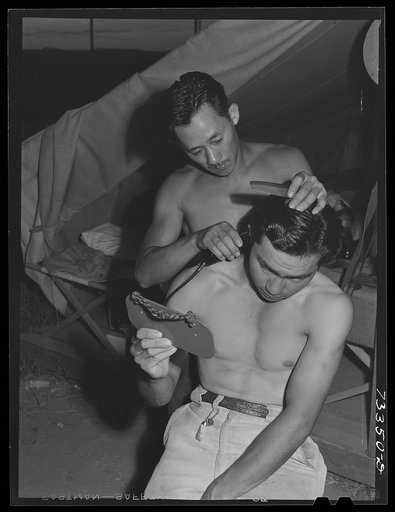 Nyssa, Oregon. FSA (Farm Security Administration) mobile camp. Japanese-Americans cut each other's hair. Under the agreement among the Japanese, the FSA and those who sponsor the Japanese in the area (the United States Employment Service and the sugar beet companies), the Japanese can go into town o