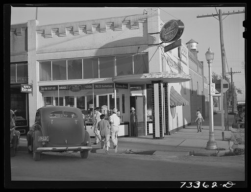 Nyssa, Oregon. Japanese-Americans who live at the FSA (Farm Security Administration) camp shopping in Nyssa. Local merchants say the Japanese-Americans are heavy spenders and have practically bought the town out