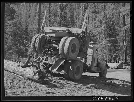 Grant County, Oregon. Malheur National Forest. When the trailer is not in use to haul logs it can be run up onto a truck