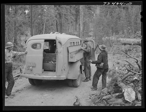 Grant County, Oregon. Malheur National Forest. Bus which carries saws, axes, and other tools used by lumberjacks into the woods