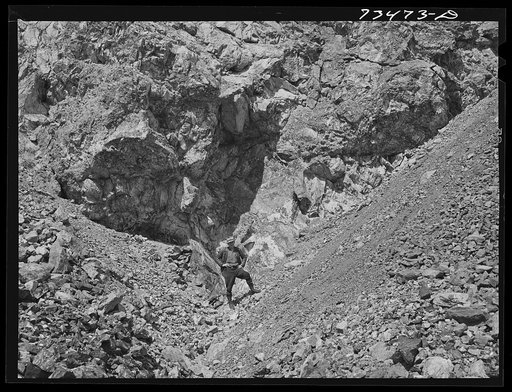 Untitled photo, possibly related to: Grant County, Oregon. Bureau of Mines field man points out chrome deposits at local mine
