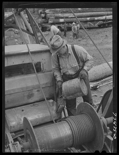 Grant County, Oregon. Malheur National Forest. Fueling a log loader