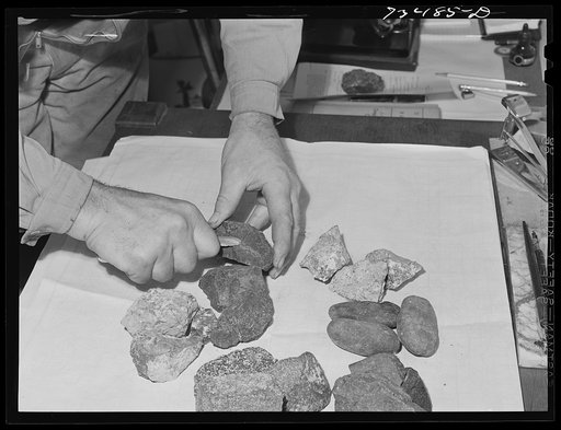 Grant County, Oregon. Examining samples of chrome ore