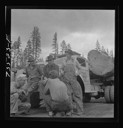 Grant County, Oregon. Malheur National Forest. Lumberjacks and truckload of logs