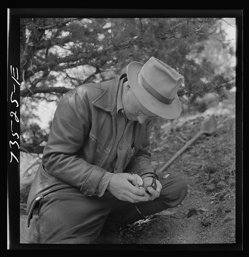 Grant County, Oregon. Bureau of Mines representative taking bearing on angle of diamond drilling for chrome ore deposits