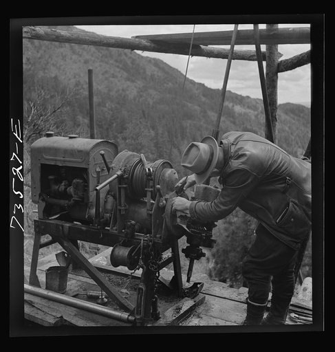 Grant County, Oregon. Bureau of Mines representative taking bearing on angle of diamond drilling for chrome ore deposits