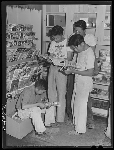 Nyssa, Oregon. Japanese-American boys at the newsstand on their weekly visit to town
