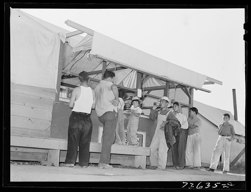Untitled photo, possibly related to: Nyssa, Oregon. FSA (Farm Security Administration) mobile camp. Canteen for soda pop, candy, ice cream at the camp, now inhabited by Japanese-Americans