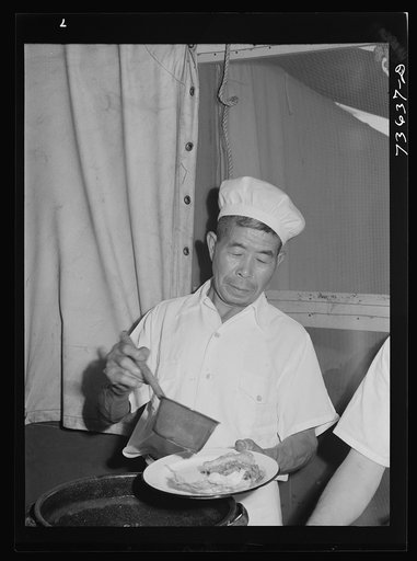 Nyssa, Oregon. FSA (Farm Security Administration) mobile camp. Chef at the camp, now inhabited by evacuated Japanese-Americans. They formed a cooperative mess, hired one of their group as chef, girls as waitresses and helpers