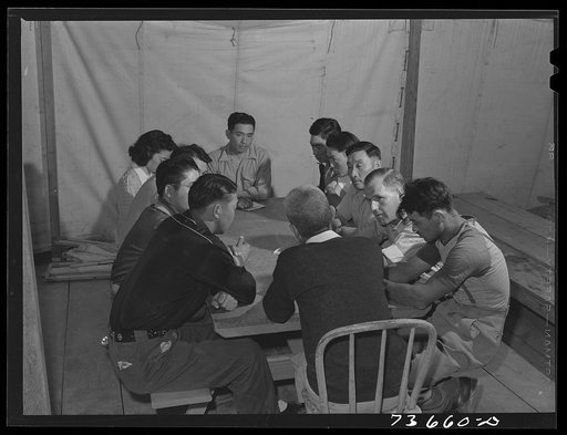 Untitled photo, possibly related to: Nyssa, Oregon. FSA (Farm Security Administration) mobile camp. Camp council meeting. The Japanese-American residents of the camp elect the council members. The council is the governing body of the camp within the general regulations of the FSA