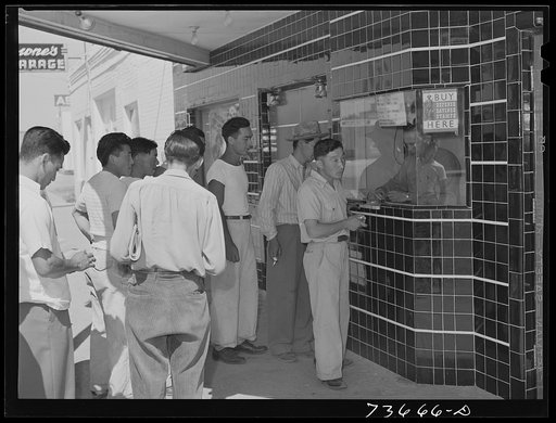 Nyssa, Oregon. The Japanese-Americans who live at the FSA (Farm Security Administration) mobile camp attend special run of picture show on Sunday