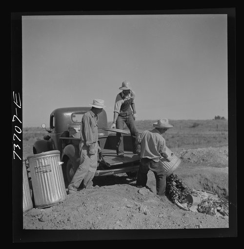 Nyssa, Oregon. FSA (Farm Security Administration) mobile camp. The Japanese-Americans cleaning their camp