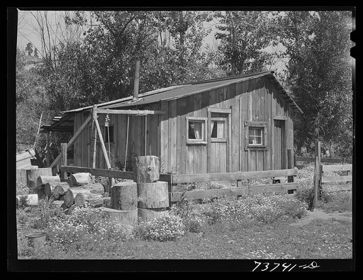Ola, Idaho. FSA (Farm Security Administration) Ola self-help cooperative. Home of a member. Practically all houses have been enlarged and improved in the last two years. Lumber from the cooperative mill is used for such construction