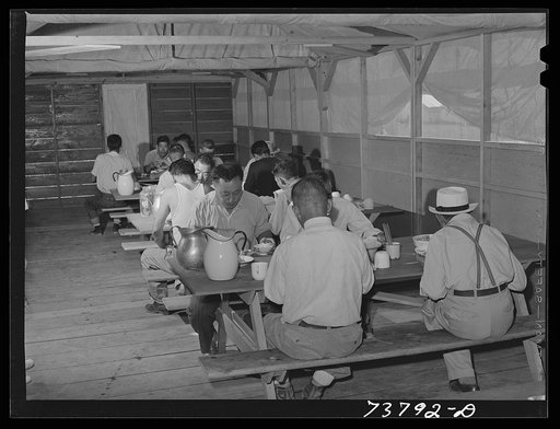 Untitled photo, possibly related to: Shelley, Idaho. FSA (Farm Security Administration) mobile camp. Japanese eat in central mess hall