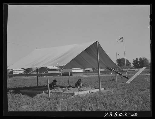 Shelley, Idaho. FSA (Farm Security Administration) mobile camp. Children's playground and community tent. This camp is now occupied by Japanese farm workers and their families
