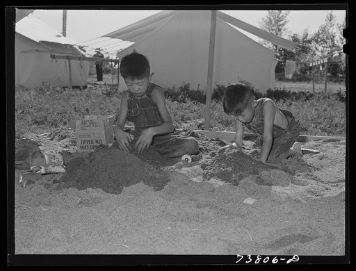 Shelley, Idaho. FSA (Farm Security Administration) mobile camp. Children's playground and community tent. This camp is now occupied by Japanese farm workers and their families