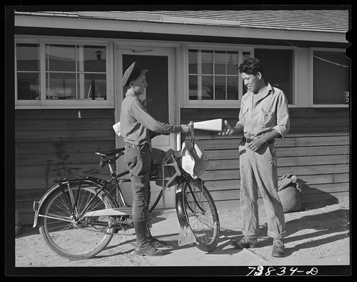 Rupert, Idaho. Former CCC (Civilian Conservation Corps) camp now under FSA (Farm Security Administration) management. Newspaper are delivered daily to the Japanese-Americans living at the camp