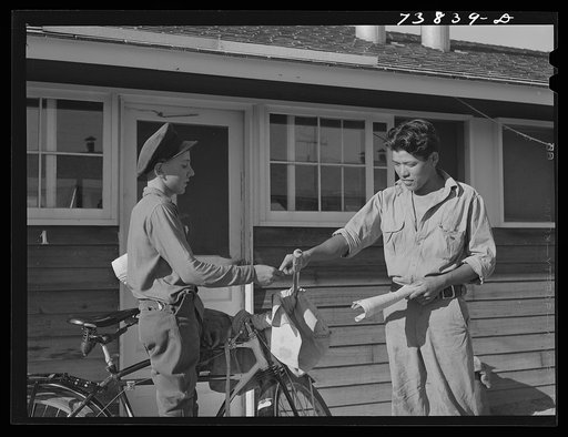 Rupert, Idaho. Former CCC (Civilian Conservation Corps) camp now under FSA (Farm Security Administration) management. Newspapers are delivered daily to the Japanese-Americans living at the camp