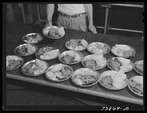 Rupert, Idaho. Former CCC (Civilian Conservation Corps) camp now under FSA (Farm Security Administration) management. Supper plates in the community mess hall of the Japanese-Americans