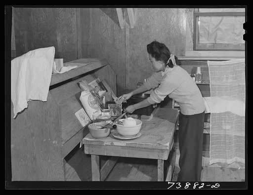 Rupert, Idaho. Former CCC (Civilian Conservation Corps) camp now under FSA (Farm Security Administration) management. A Japanese-American girl in the apartment she has arranged for her husband and herself in the barrack building