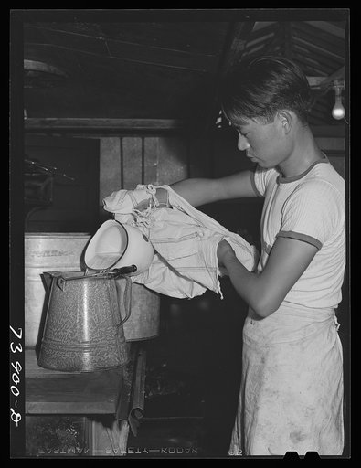 Rupert, Idaho. Former CCC (Civilian Conservation Corps) camp now under FSA (Farm Security Administration) management. Making tea for supper at the community mess hall of the Japanese-Americans