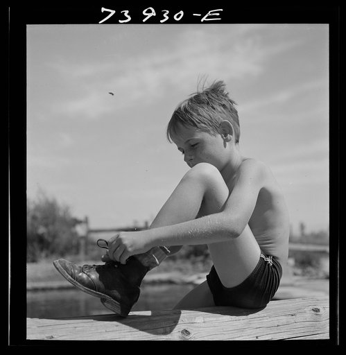 Rupert, Idaho. Schoolboy at swimming pool