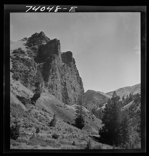 Lemhi County, Idaho. Sheer cliffs rise from the road along Williams Creek