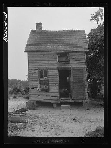 Yamacis farm house. Back of house is an orchard, and then fields of tobacco. Ridge, Maryland. Saint Mary's County
