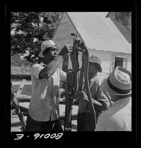 Pump head is assembled before attaching to pump rod. John Fredrick well project, Saint Mary's County, Maryland