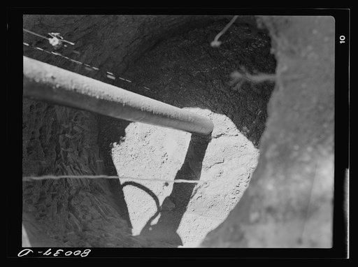 Untitled photo, possibly related to: The casing is cemented to insure tightness. Safe well demonstration near La Plata, Maryland, Charles County