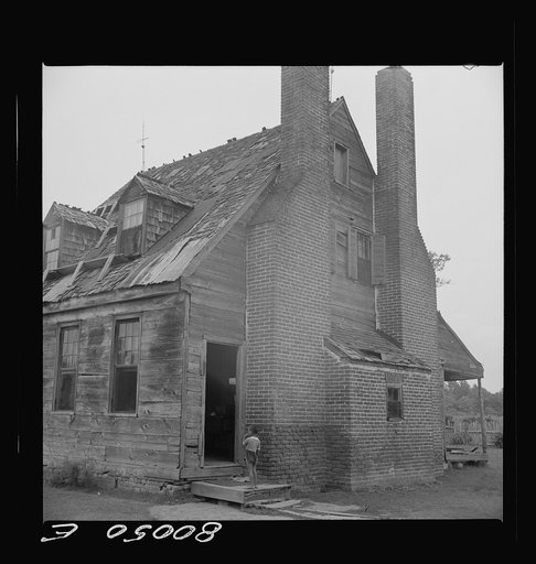 Untitled photo, possibly related to: Briscoe house seen from south. It was an old plantation home now inhabited by Negroes, descendants of the former owner's slaves. Near Ridge, Maryland. Saint Mary's County