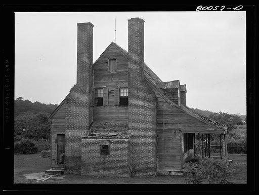 Briscoe house seen from south. It was an old plantation home now inhabited by Negroes, descendants of the former owner's slaves. Near Ridge, Maryland. Saint Mary's County