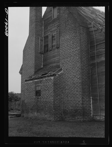 Massive chimneys, whose base formed brick pantry, about the only room in house not ready to fall down. John Biscoe farmhouse near Ridge, Maryland. Saint Mary's County