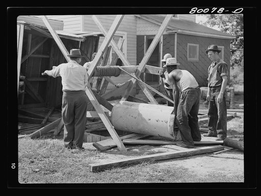 The first section of concrete pipe ready to be placed in well. Safe well demonstration near La Plata, Maryland. Charles County