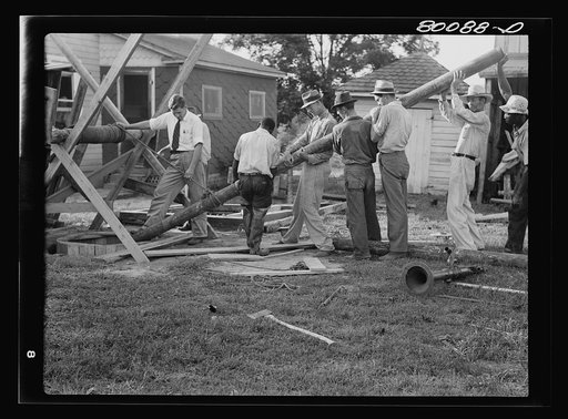 Additional five inch steel casing connects the concrete reservoir with the pump. Safe well demonstration, La Plata, Maryland. Charles County
