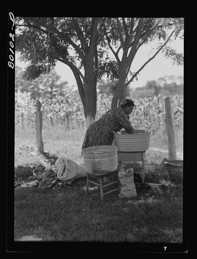 Washing clothes near the old well. Ridge well project, Saint Mary's County, Maryland
