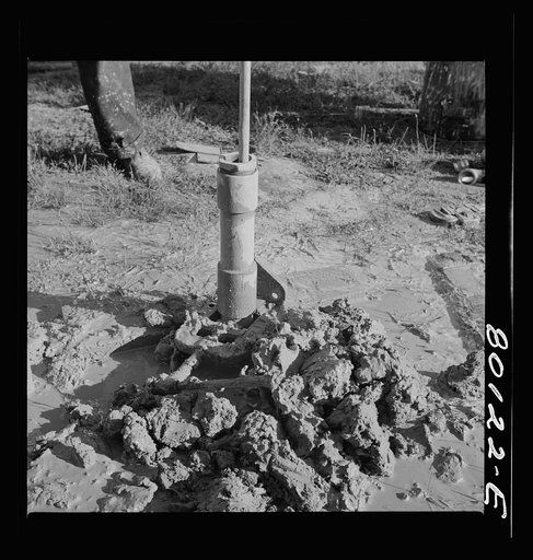 Casing and pump rod before the final filling with sand and gravel. Ridge well project, St. Marys County, Maryland