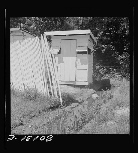 Drainage ditch runs under privy and down to house. Good drainage site for privy would have avoided this health hazard. Saint Mary's County, Maryland