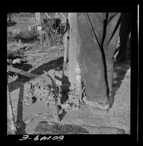 Untitled photo, possibly related to: Casing and pump rod before the final filling with sand and gravel. Ridge well project, St. Marys County, Maryland