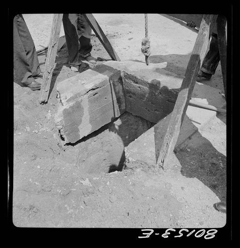 Cement lining partially broken away. John Hardesty well project, Charles County, Maryland