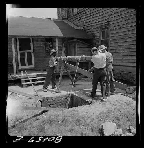 Untitled photo, possibly related to: Windlass lifts cement wall from well. John Hardesty well project, Charles County, Maryland