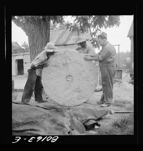 Cement cap after lifting from mould in ground. John Hardesty well project, Charles County, Maryland