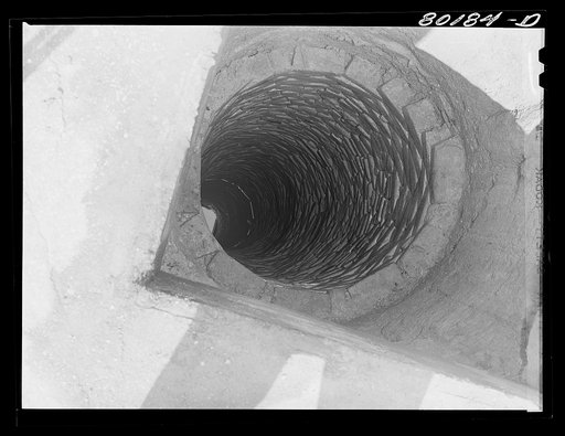 The well, thirty feet deep, is lined with unmortared brick. John Hardesty well project, Charles County, Maryland