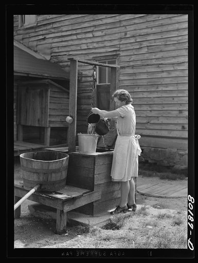 The dug well before repair. The water will be safe for drinking if surface water, insects, animals and dirty containers can be kept out of it. John Hardesty well project, Charles County, Maryland