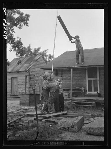 Untitled photo, possibly related to: The pumping cylinder is on the end of the drop pipe and in the water. Safe well demonstration near La Plata, Maryland