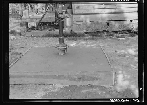 A top slab of concrete is poured in place. Safe well demonstration near La Plata, Maryland
