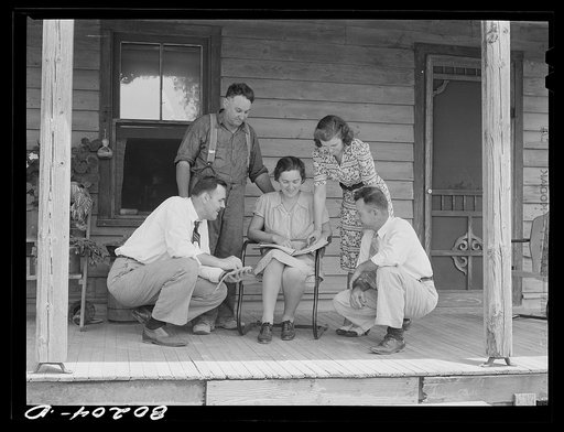 Untitled photo, possibly related to: Health officer, county supervisor and supervisor of home economics discuss home plan with the Hardesty family. Charles County, Maryland