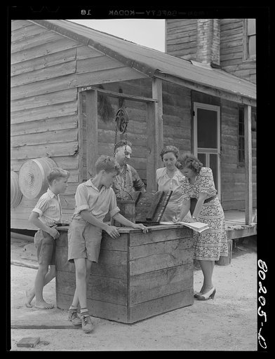 Untitled photo, possibly related to: Supervisor of home economics talking over problem with Hardesty family. Charles County, Maryland